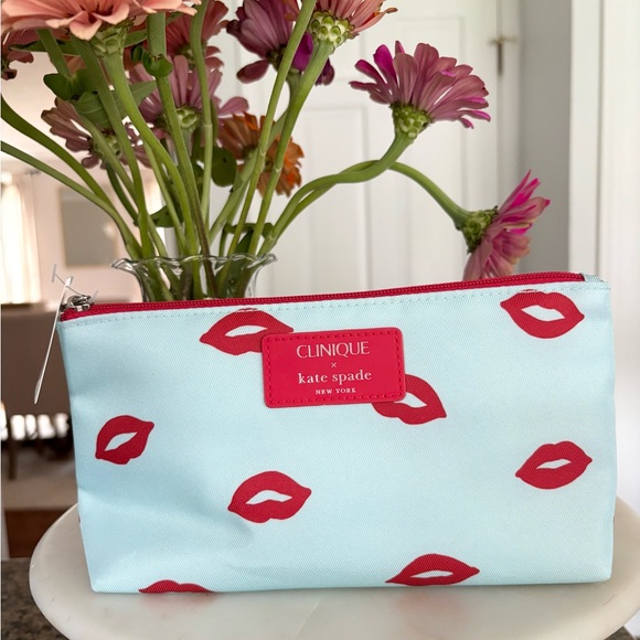 kate spade Handbags - Clinique X Kate Spade NEW Light Blue Lip Print Zip Up Makeup Bag